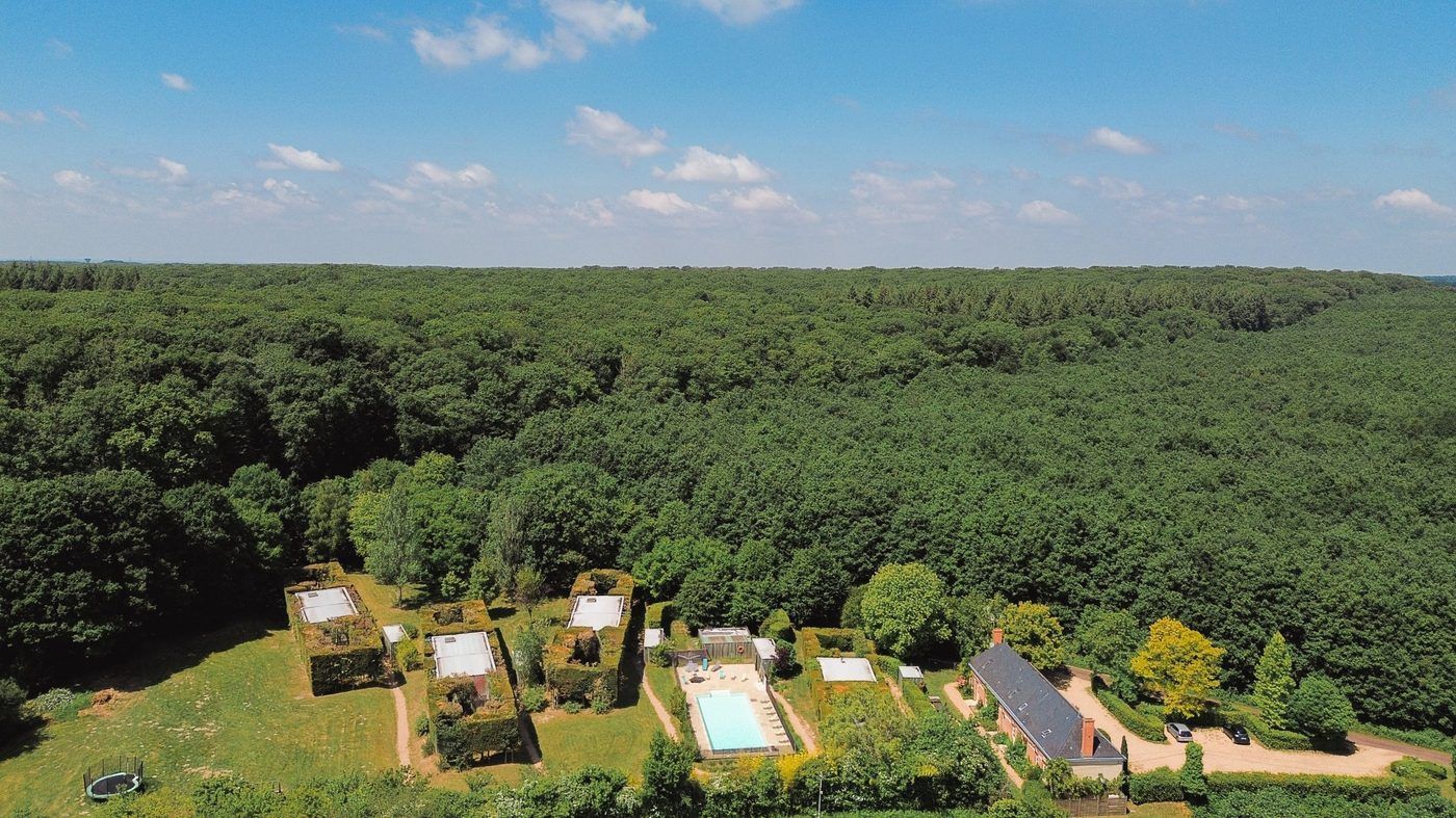 Aerial view of Les Tropes at the edge of the Bercé Forest